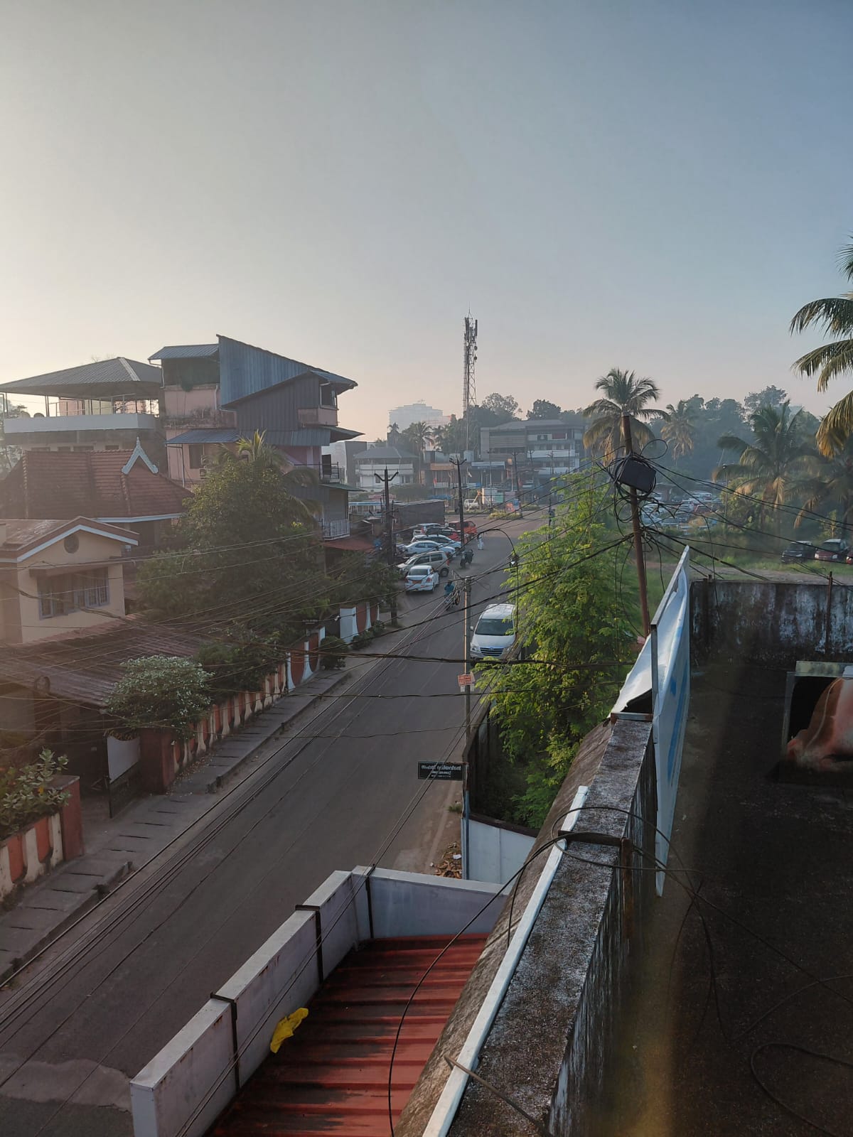 Property for Sale in Edappally: 11.25 Cents of Land with a House and a Commercial Building (7 Shop Units)