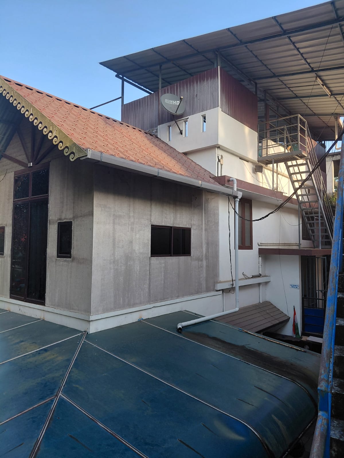 Property for Sale in Edappally: 11.25 Cents of Land with a House and a Commercial Building (7 Shop Units)