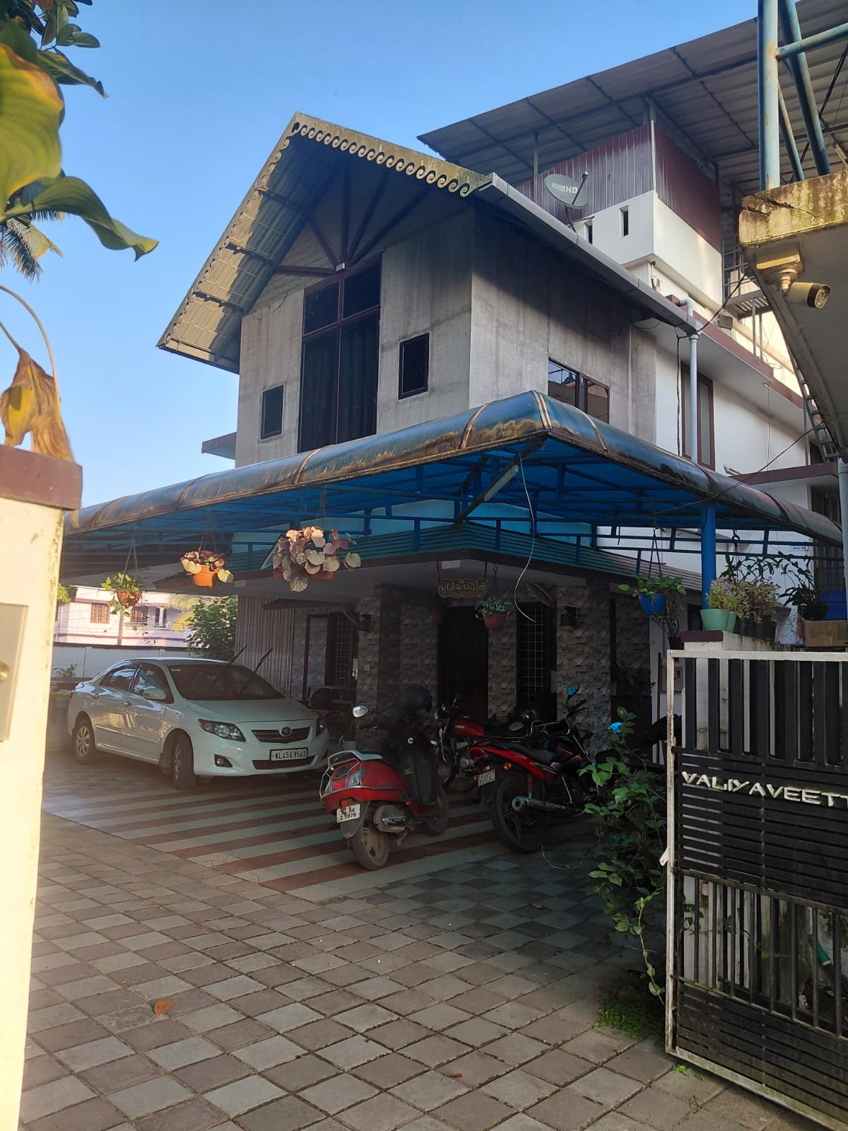 Property for Sale in Edappally: 11.25 Cents of Land with a House and a Commercial Building (7 Shop Units)