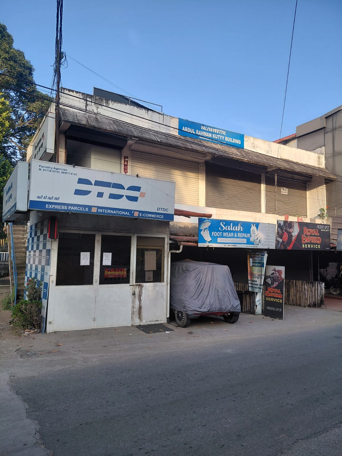Property for Sale in Edappally: 11.25 Cents of Land with a House and a Commercial Building (7 Shop Units)